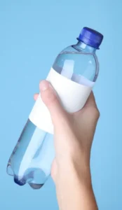 person holding a water bottle
